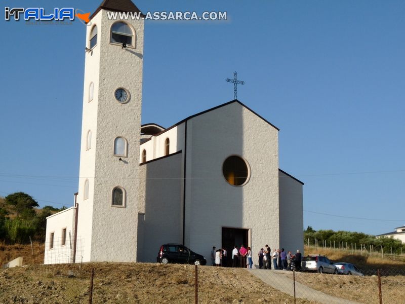 la messa vespertina  di un sabato di luglio